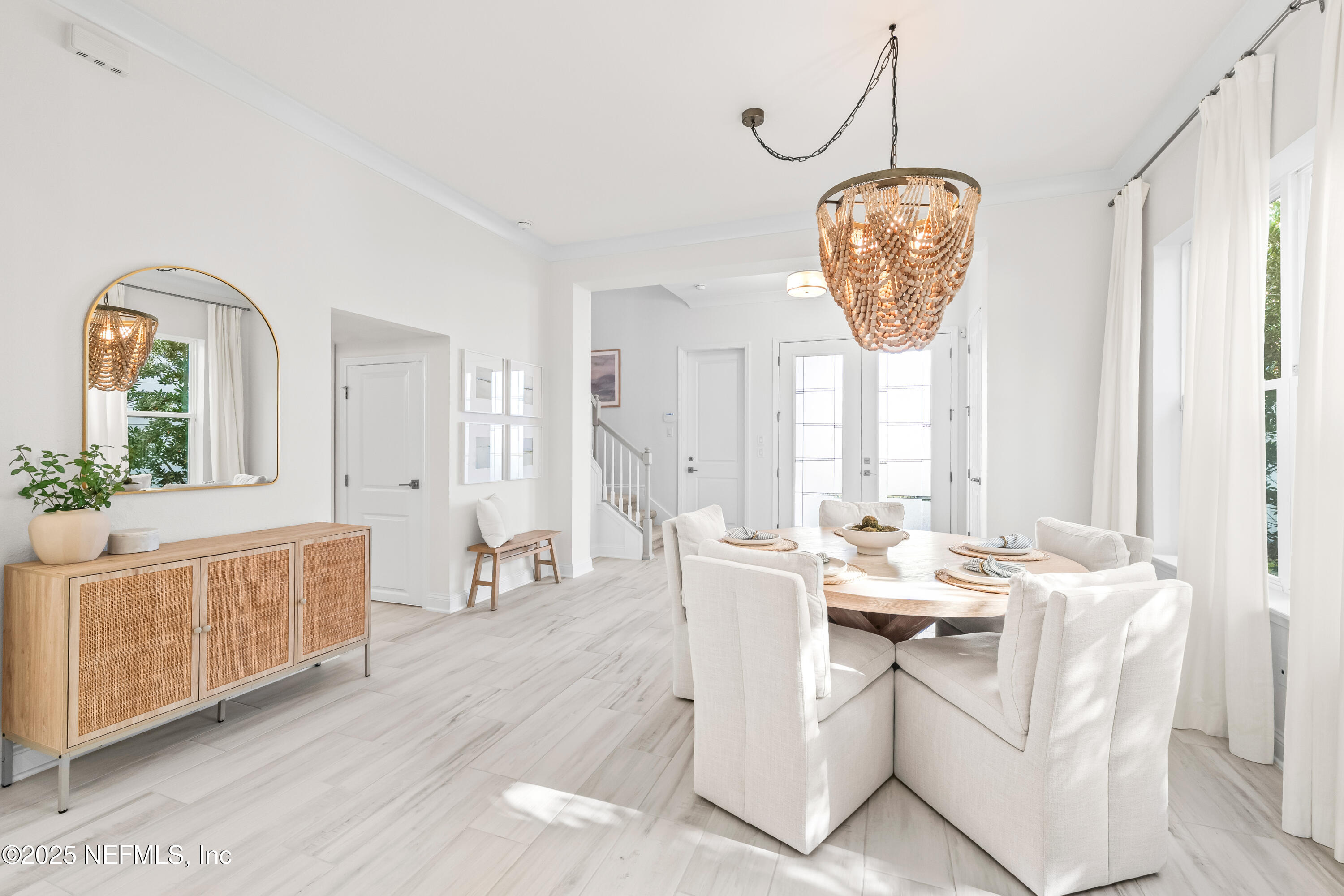 10459 Innovation Way Jacksonville, FL 32256 - Photo 7 of 54 a view of a dining room with furniture window and wooden floor