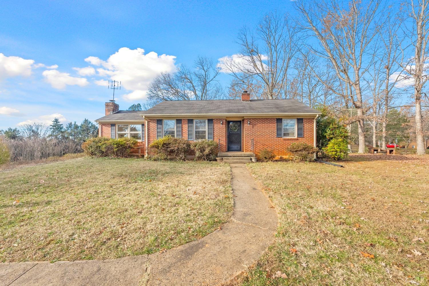 907 High Peak Road Monroe, VA 24574 - Photo 53 of 61 a front view of a house with garden