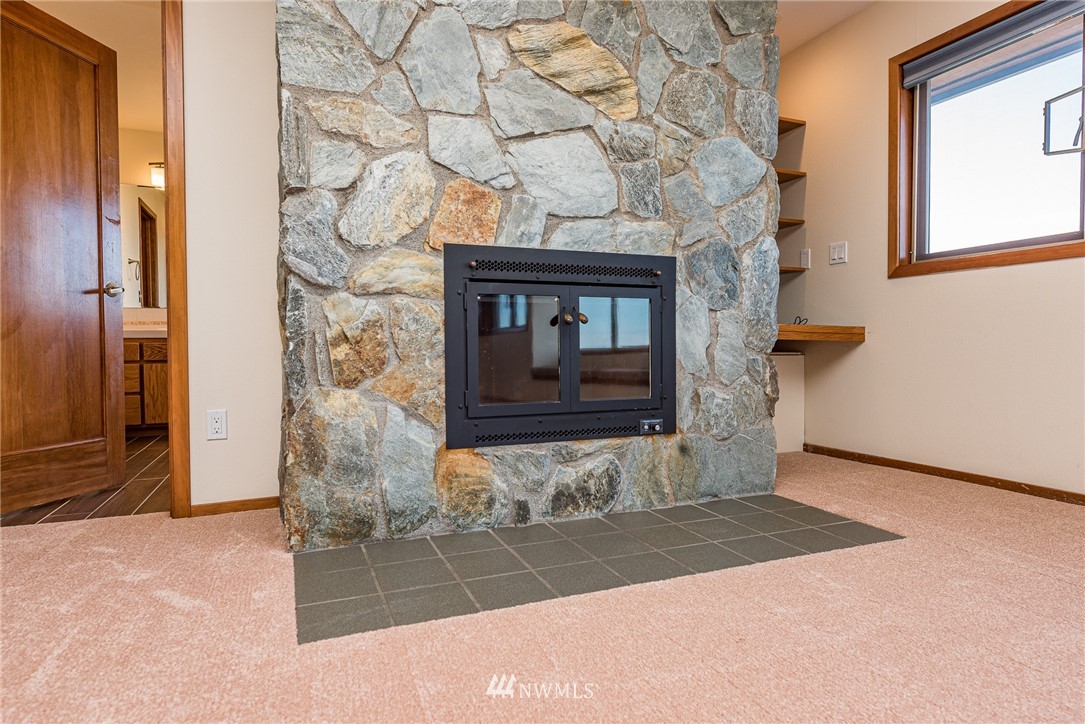 543 Ravens Ridge Road Sequim, WA 98382 - Photo 32 of 40 a front view of a house with parking area