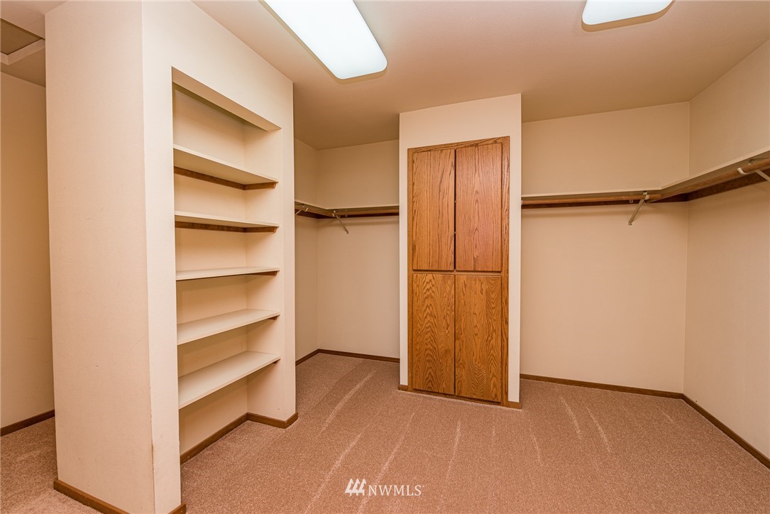 543 Ravens Ridge Road Sequim, WA 98382 - Photo 36 of 40 a view of walk in closet with empty racks