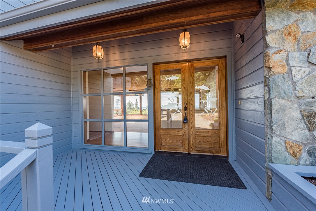 543 Ravens Ridge Road Sequim, WA 98382 - Photo 6 of 40 a view of empty room with wooden floor and fan