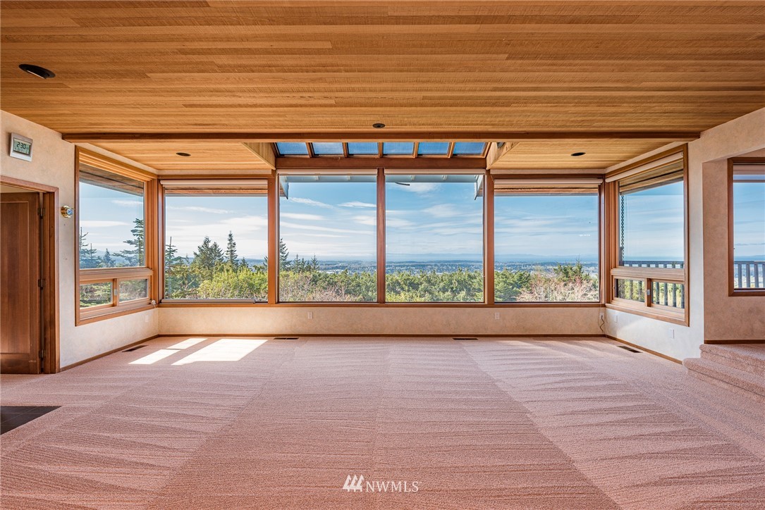 543 Ravens Ridge Road Sequim, WA 98382 - Photo 8 of 40 a view of an empty room with a window