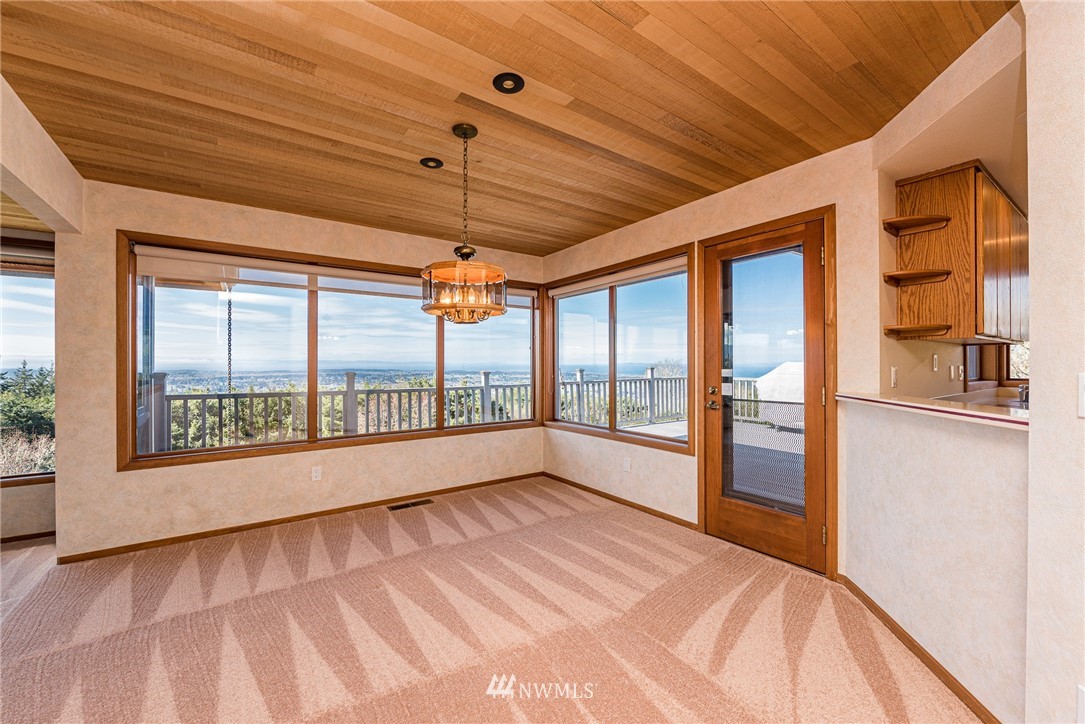 543 Ravens Ridge Road Sequim, WA 98382 - Photo 10 of 40 a view of empty room with wooden floor and fan
