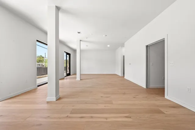 a view of a livingroom with wooden floor