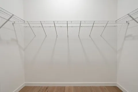 a picture of a bench in a white building