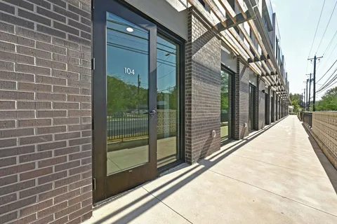 a view of balcony with a potted plant