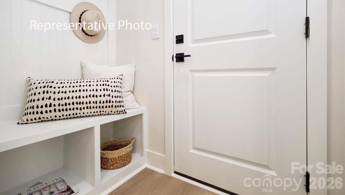 3117 Spring Iris Drive Denver, NC 28037 - Photo 30 of 42 a picture of a room with wooden floor