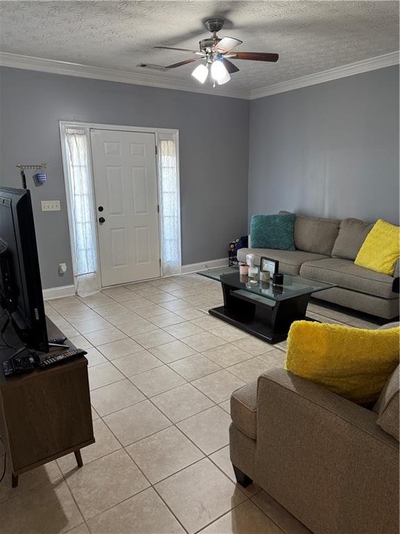 24 Intown Place Fayetteville, GA 30214 - Photo 11 of 18 a living room with furniture and a flat screen tv