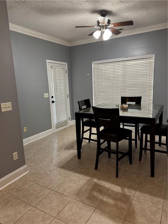 24 Intown Place Fayetteville, GA 30214 - Photo 6 of 18 a view of a dining room with furniture