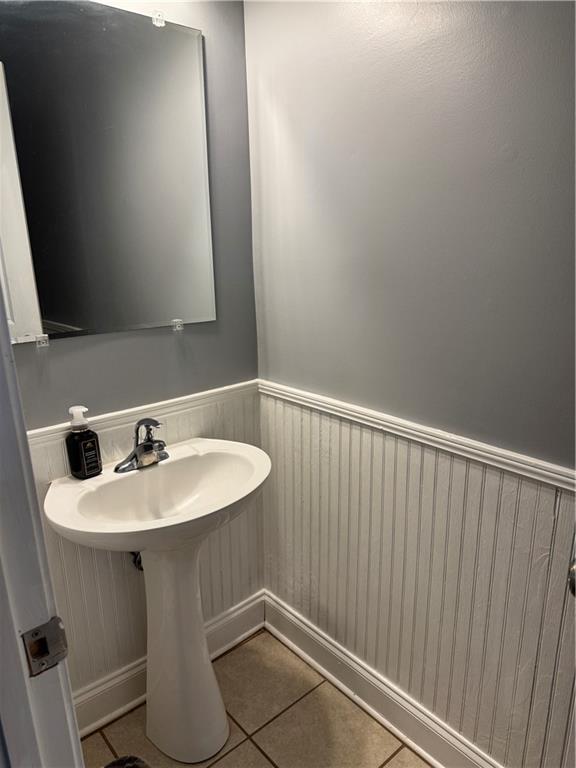 24 Intown Place Fayetteville, GA 30214 - Photo 8 of 18 a bathroom with a sink and a mirror