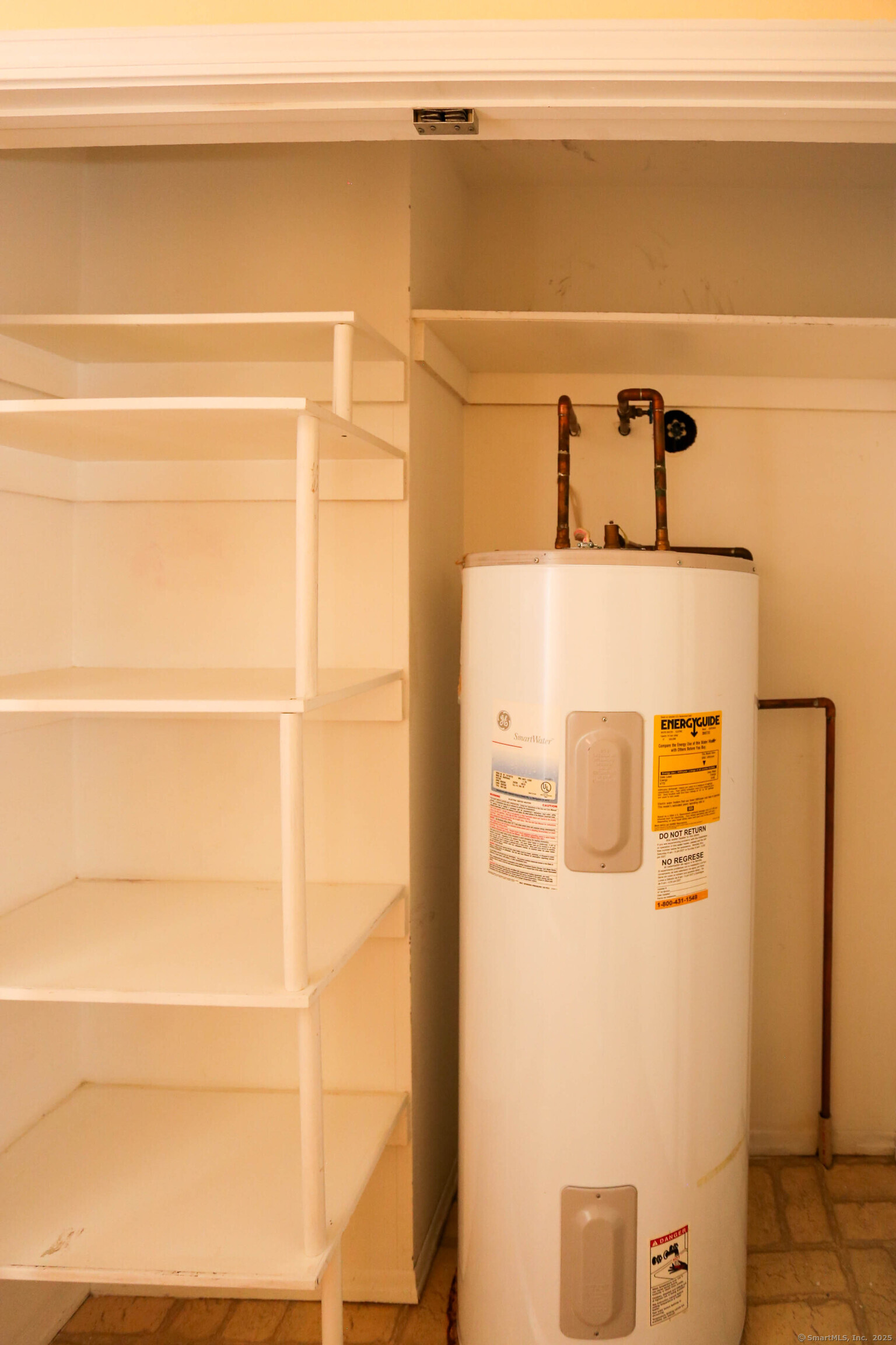 61 Seaview Avenue, Unit 51 Stamford, CT 06902 - Photo 21 of 27 a view of a refrigerator