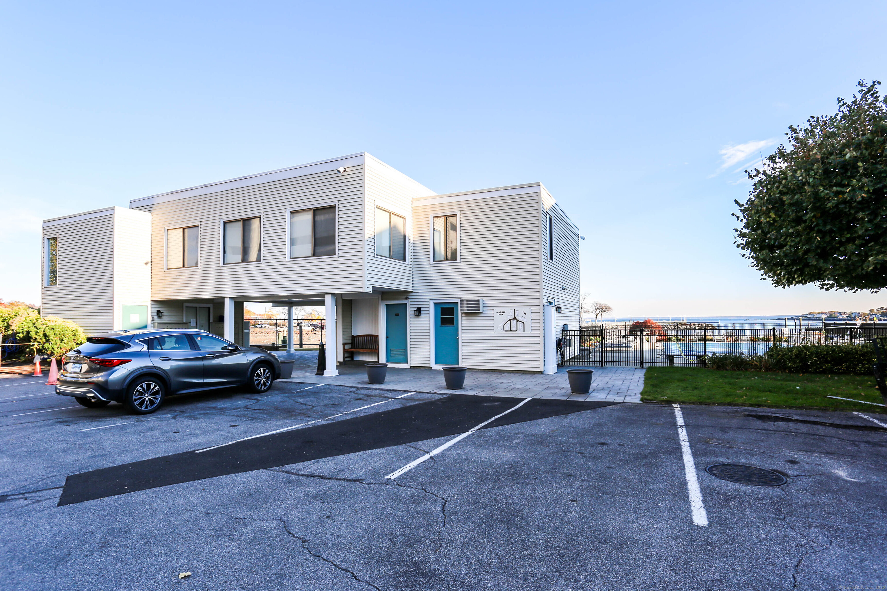 61 Seaview Avenue, Unit 51 Stamford, CT 06902 - Photo 27 of 27 a view of street with parked cars