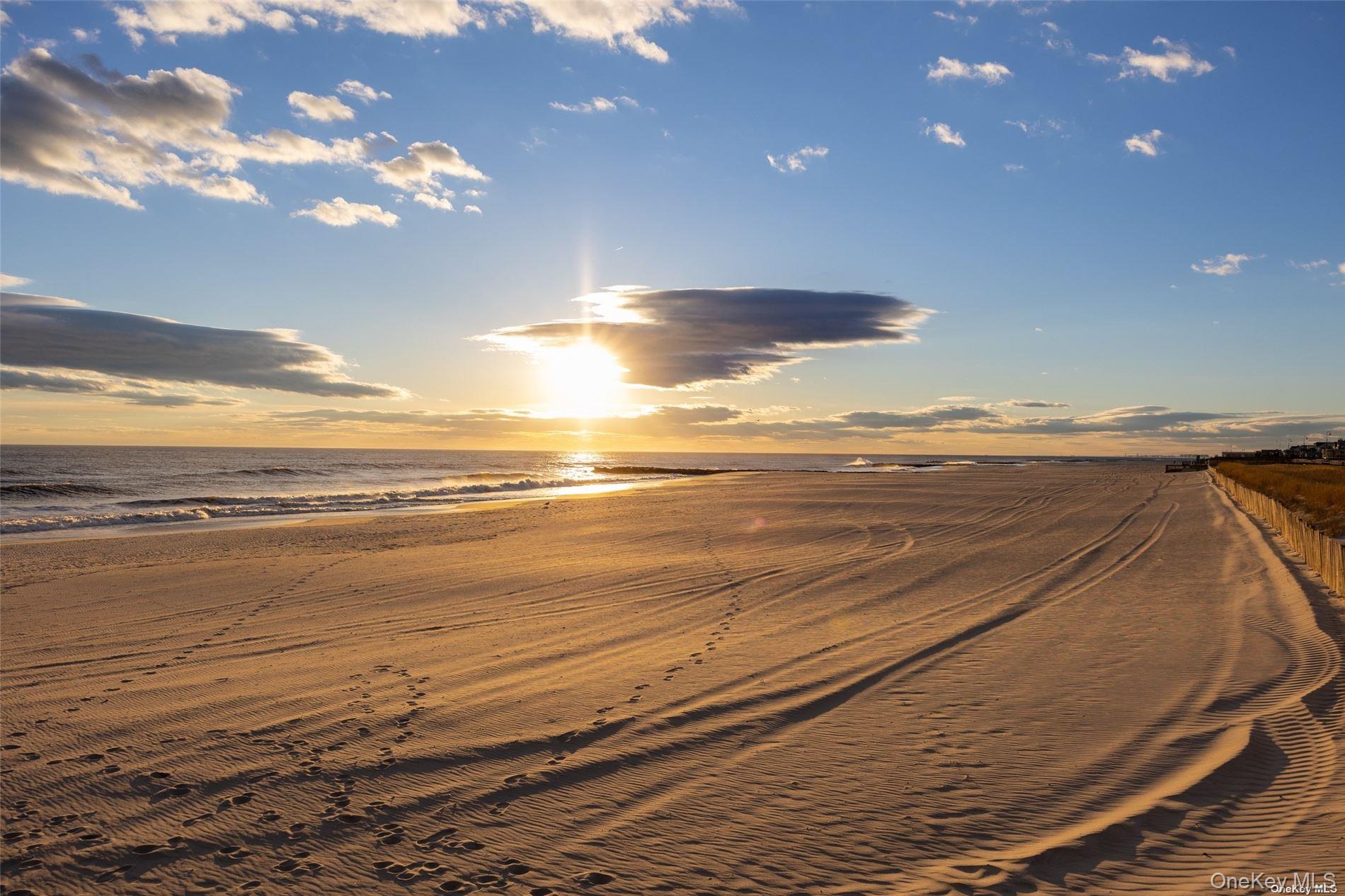 79 Rochester Avenue, Unit GARDEN Long Beach, NY 11561 - Photo 13 of 15 a view of an ocean beach