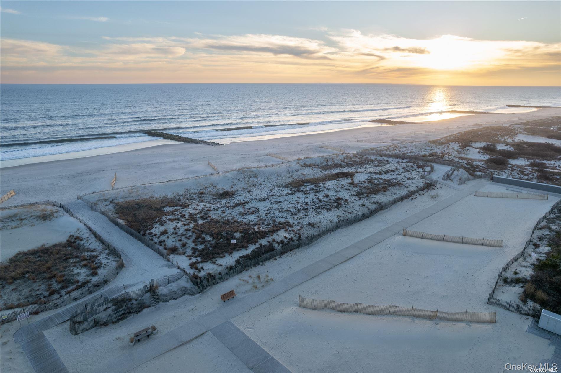79 Rochester Avenue, Unit GARDEN Long Beach, NY 11561 - Photo 14 of 15 a view of an ocean beach
