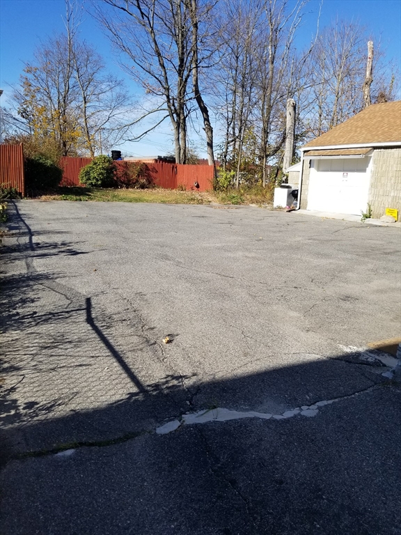 55 Granite Street Webster, MA 01570 - Photo 4 of 5 a view of road with large trees