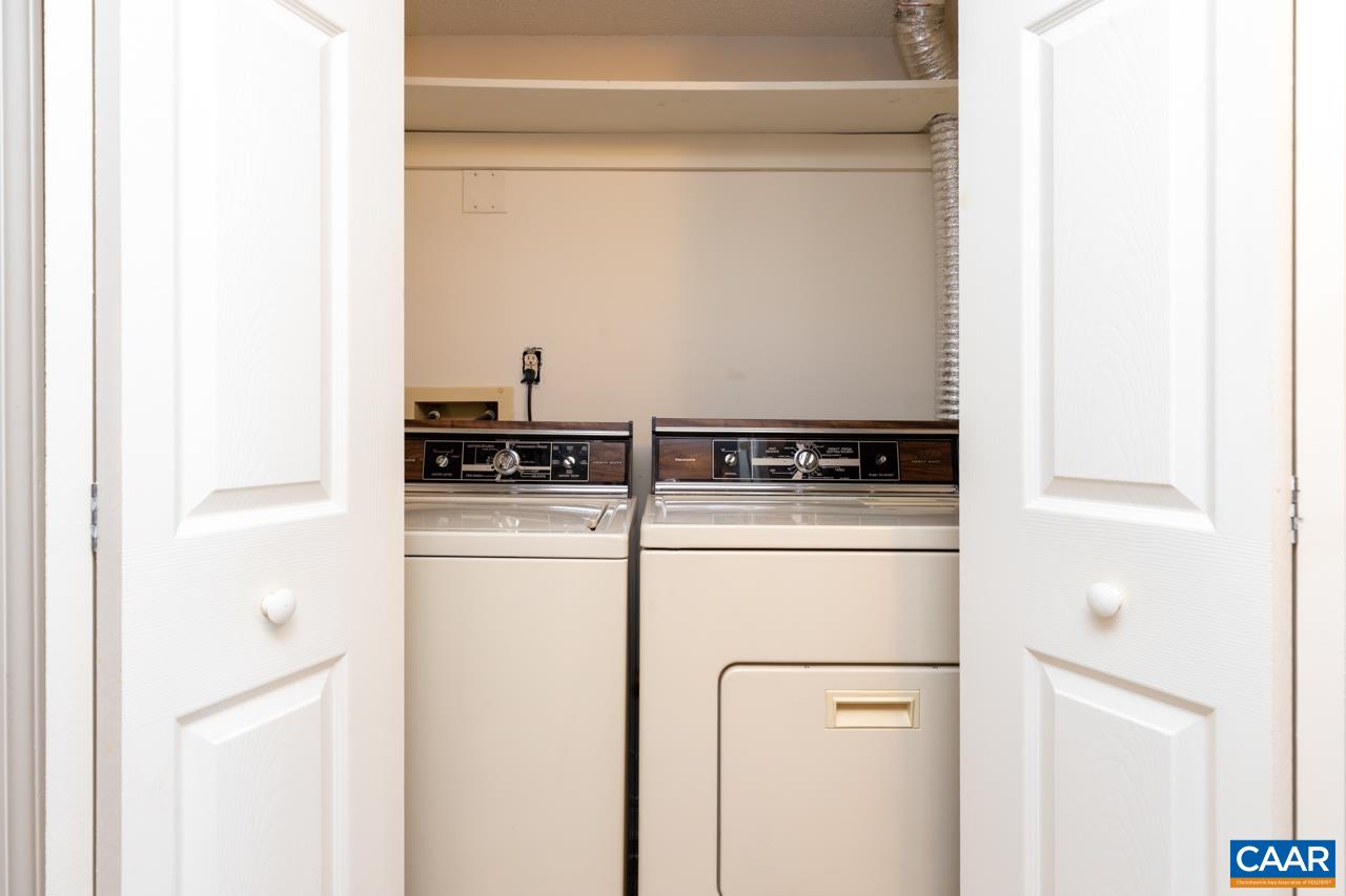 2053 Stone Ridge Roseland, VA 22967 - Photo 21 of 22 a kitchen with a refrigerator and a stove