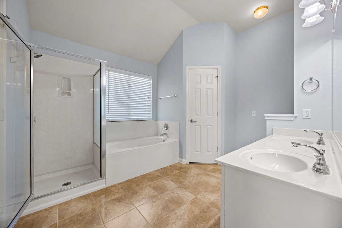 1323 Anna Palm Way Round Rock, TX 78665 - Photo 17 of 29 a bathroom with a sink and a mirror