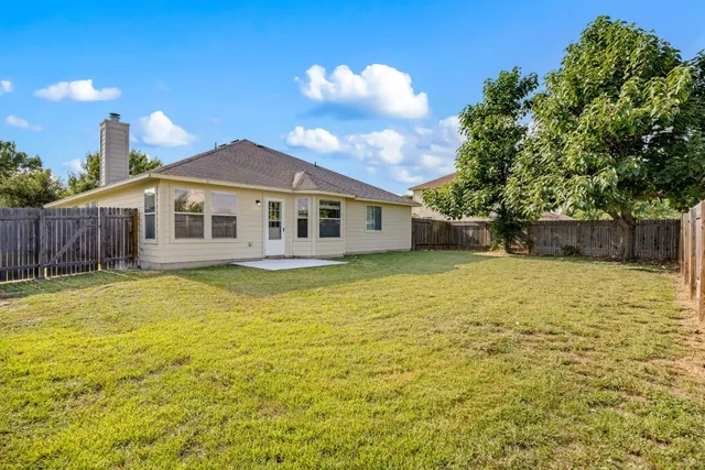 a view of a house with a swimming pool