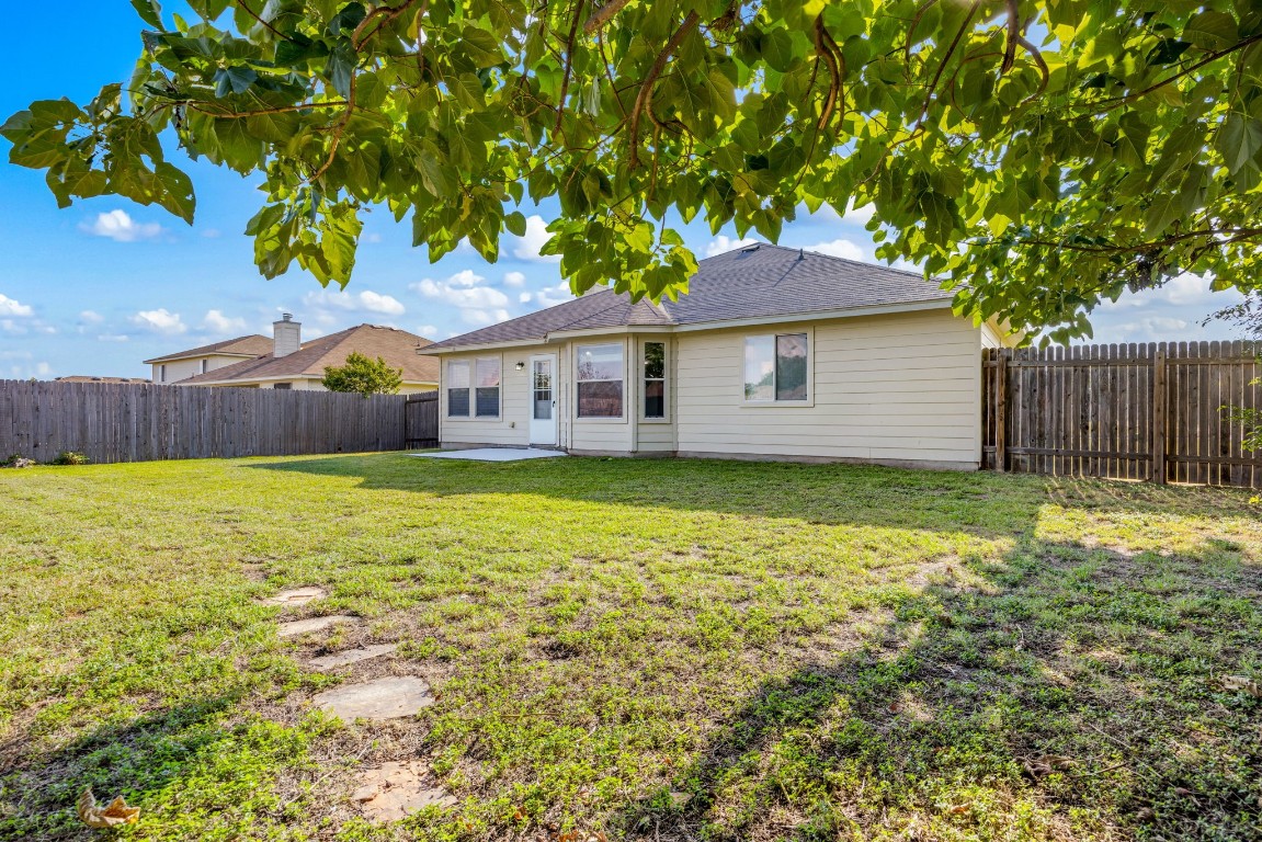 1323 Anna Palm Way Round Rock, TX 78665 - Photo 28 of 29 a front view of a house with a yard