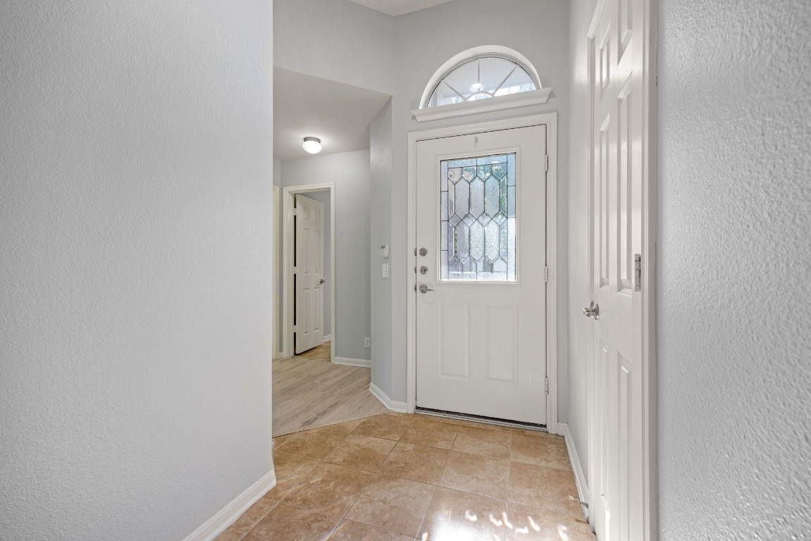 1323 Anna Palm Way Round Rock, TX 78665 - Photo 4 of 29 a view of an entryway with wooden floor