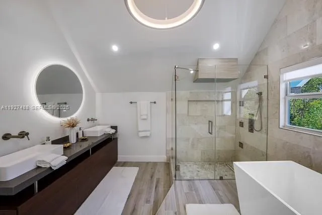 a very nice looking rest room with a large window