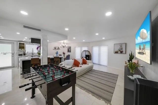 a living room with furniture and a table