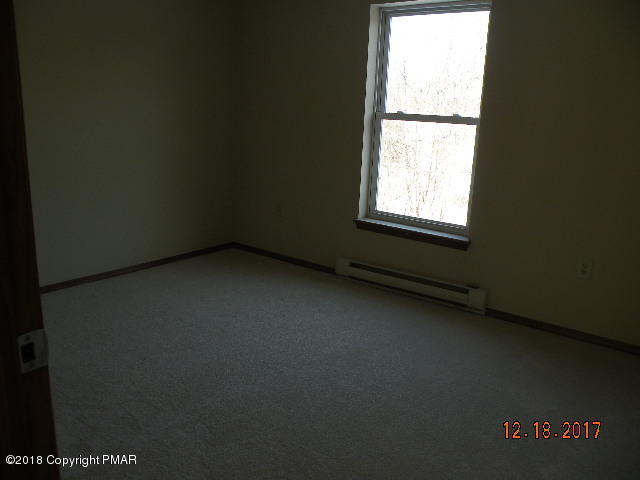 1604 Clover Road Long Pond, PA 18334 - Photo 15 of 18 a view of an empty room with a window