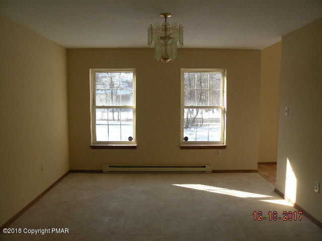 1604 Clover Road Long Pond, PA 18334 - Photo 7 of 18 a view of an empty room with a window