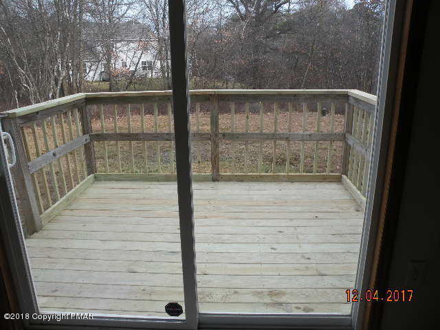 1604 Clover Road Long Pond, PA 18334 - Photo 8 of 18 a view of balcony with wooden floor