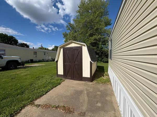 a view of a back yard of the house