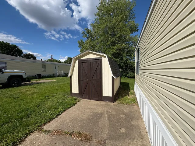 a view of a back yard of the house