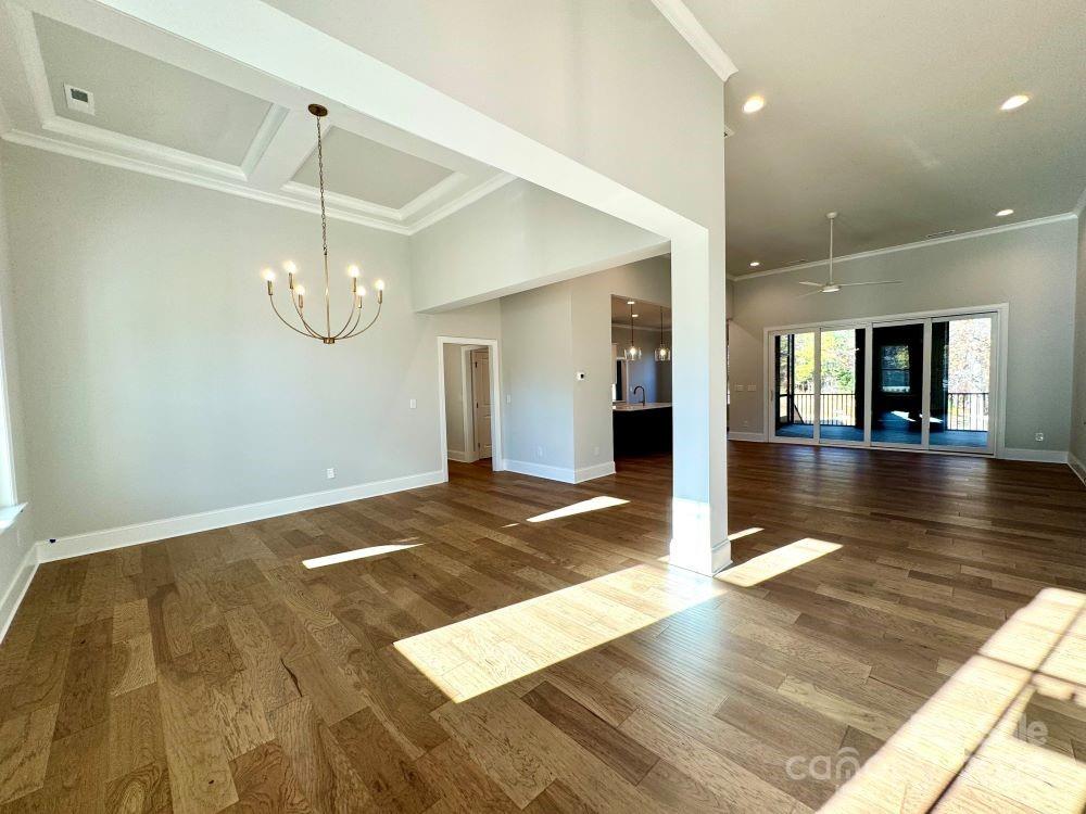 3850 Willow Grove Lane, Unit 24 Concord, NC 28025 - Photo 21 of 40 a view of empty room with wooden floor