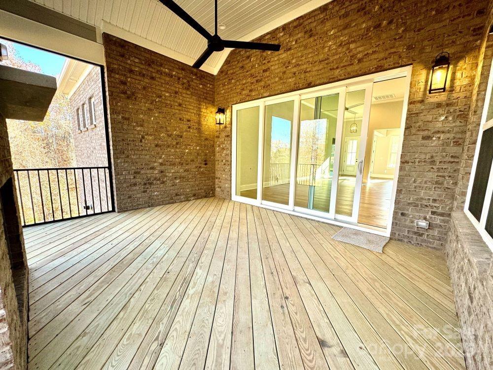 3850 Willow Grove Lane, Unit 24 Concord, NC 28025 - Photo 22 of 40 a view of a wooden deck