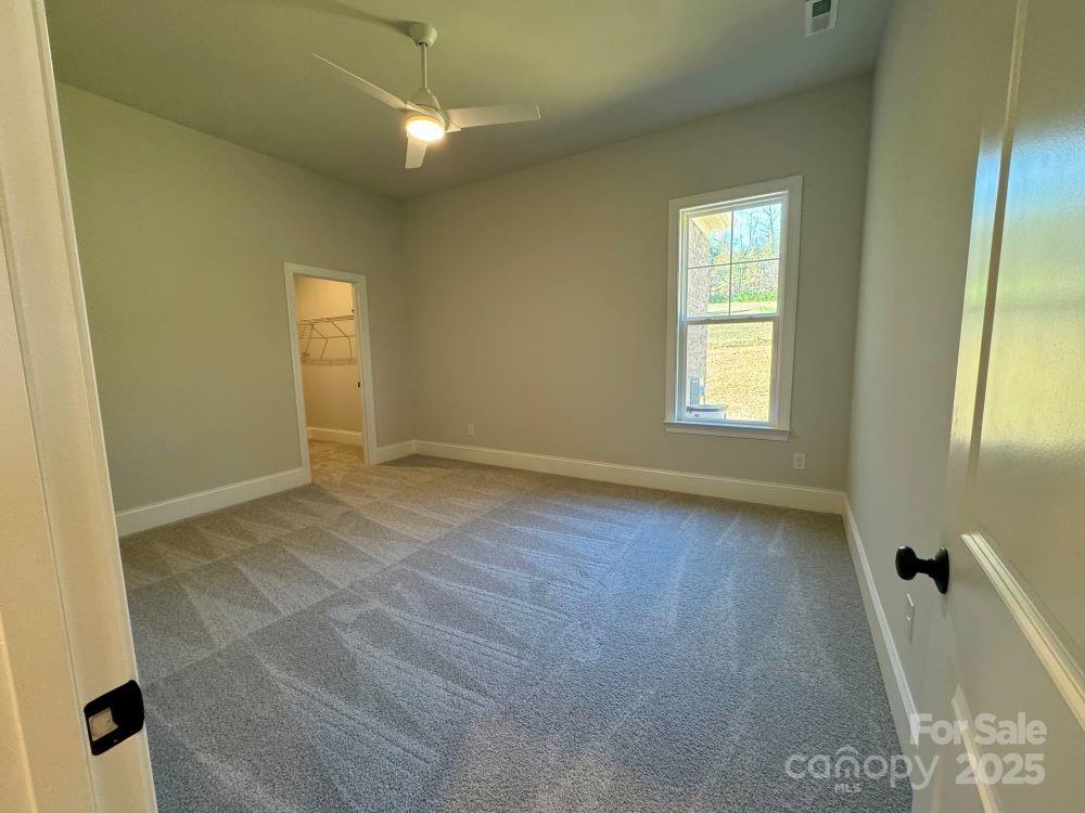 3850 Willow Grove Lane, Unit 24 Concord, NC 28025 - Photo 31 of 40 a view of an empty room with a window