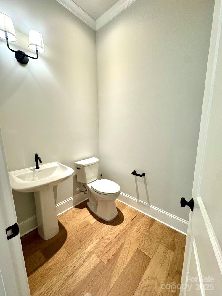 3850 Willow Grove Lane, Unit 24 Concord, NC 28025 - Photo 34 of 40 a bathroom with a sink and a toilet