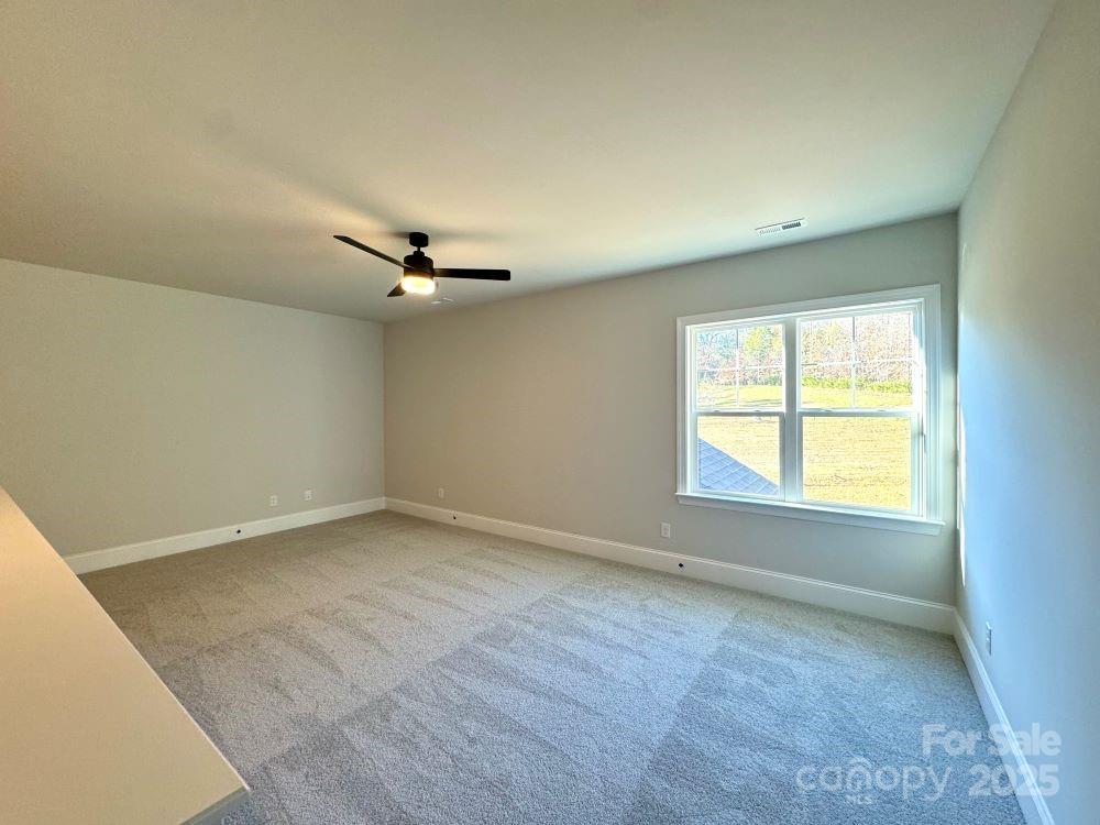 3850 Willow Grove Lane, Unit 24 Concord, NC 28025 - Photo 40 of 40 an empty room with a window
