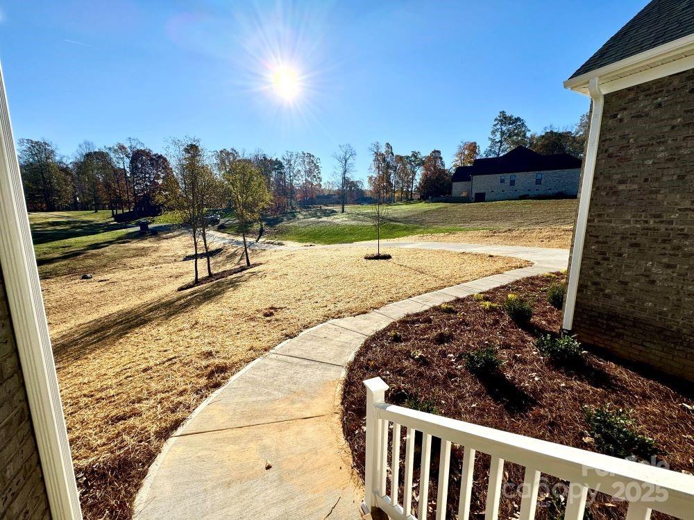 3850 Willow Grove Lane, Unit 24 Concord, NC 28025 - Photo 5 of 40 a view of a backyard