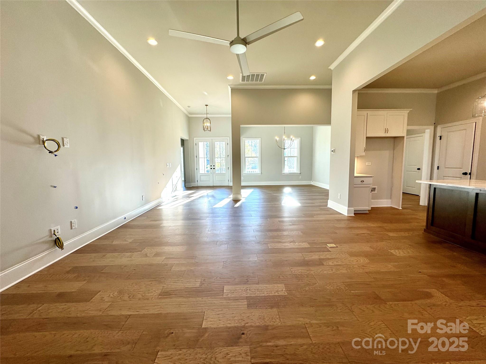 3850 Willow Grove Lane, Unit 24 Concord, NC 28025 - Photo 7 of 40 a view of an empty room and a kitchen