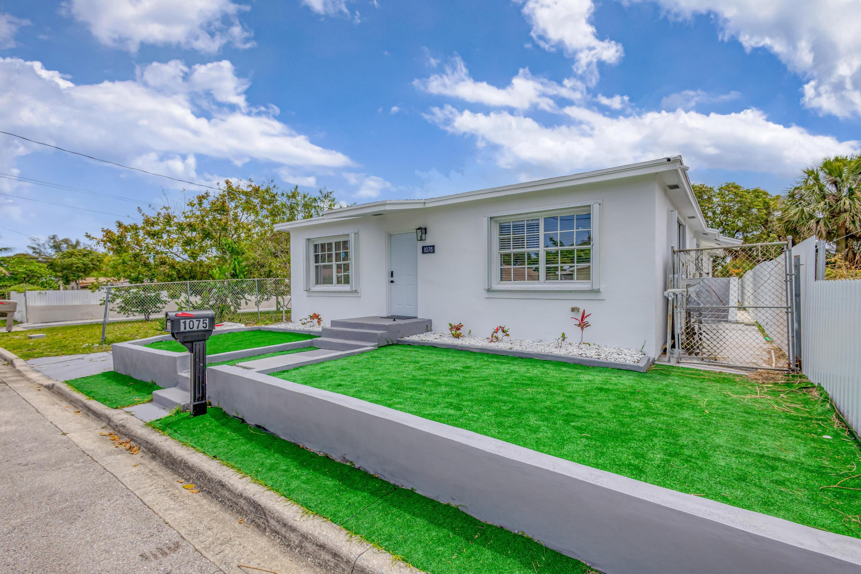 1075 West 30th Street Riviera Beach, FL 33404 - Photo 2 of 66 front