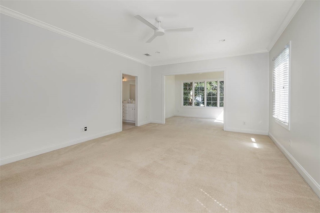 155 Limeburn Trail St. Simons Island, GA 31522 - Photo 18 of 29 Primary Bedroom with ensuite to left