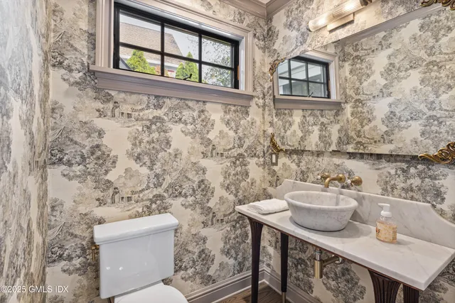 a bathroom with a sink and a toilet