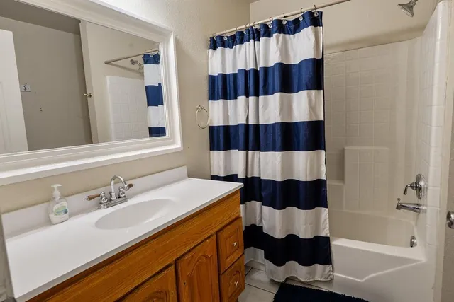 a bathroom with a sink and a bathtub