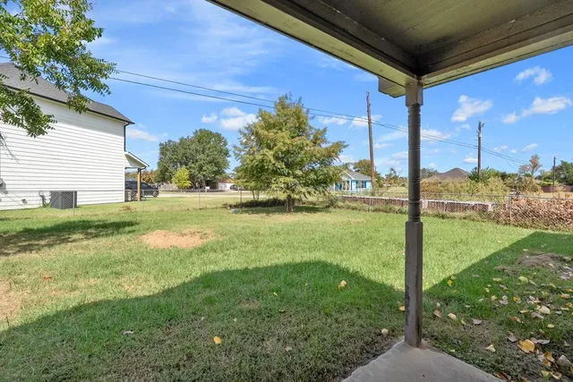 a view of a house with a big yard