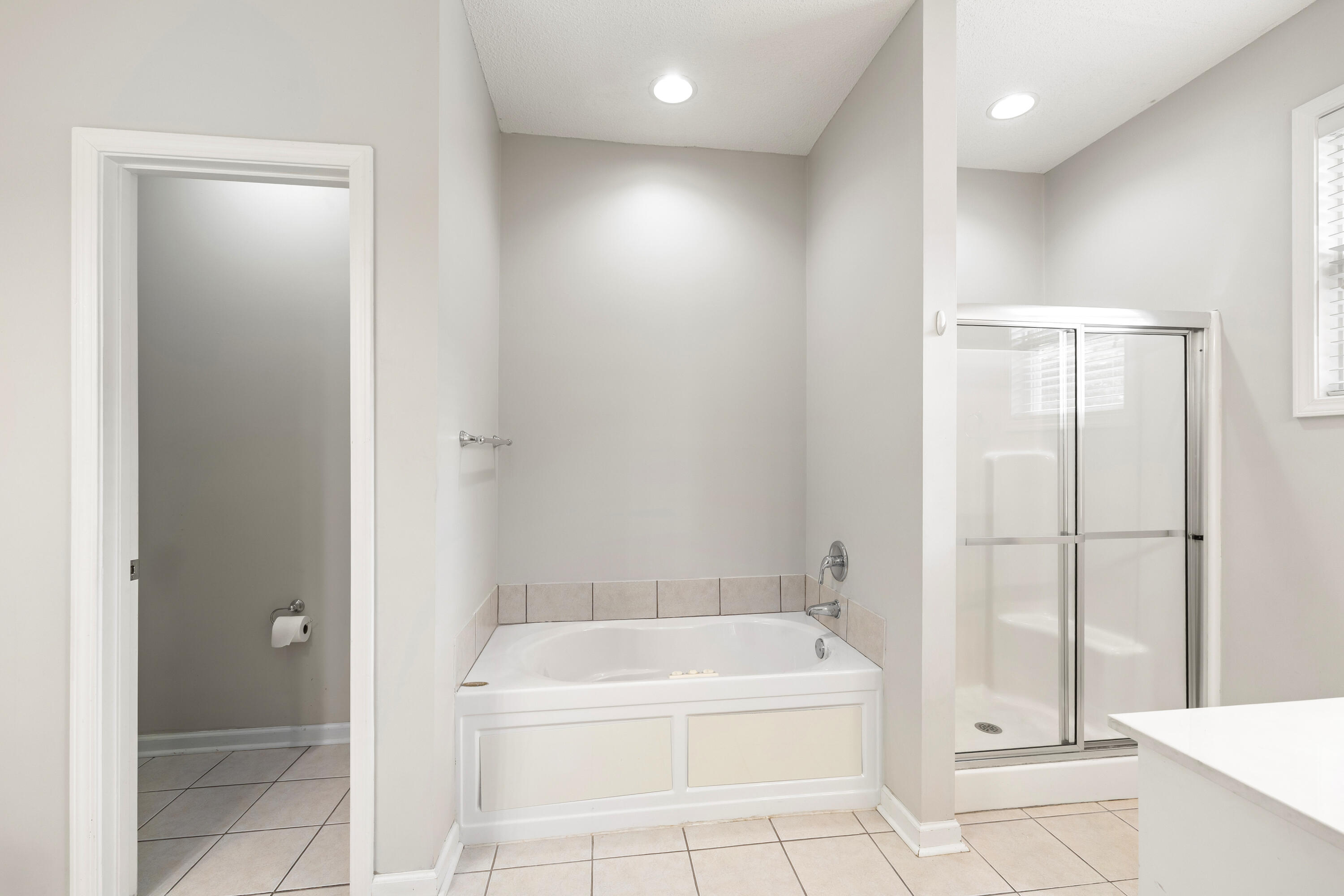 3225 Mayflower Lane Sumter, SC 29150 - Photo 29 of 42 MASTER BATH HAS JACUZZI TUB, STAND UP SHOWER, SEPERATE POTTY ROOM, DOUBLE VANITIES, WALK IN CLOSETS