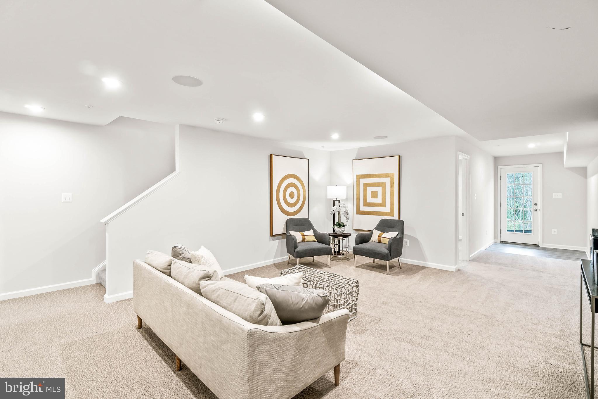 7109 Gladebrook Road Brandywine, MD 20613 - Photo 14 of 26 a living room with furniture and a window
