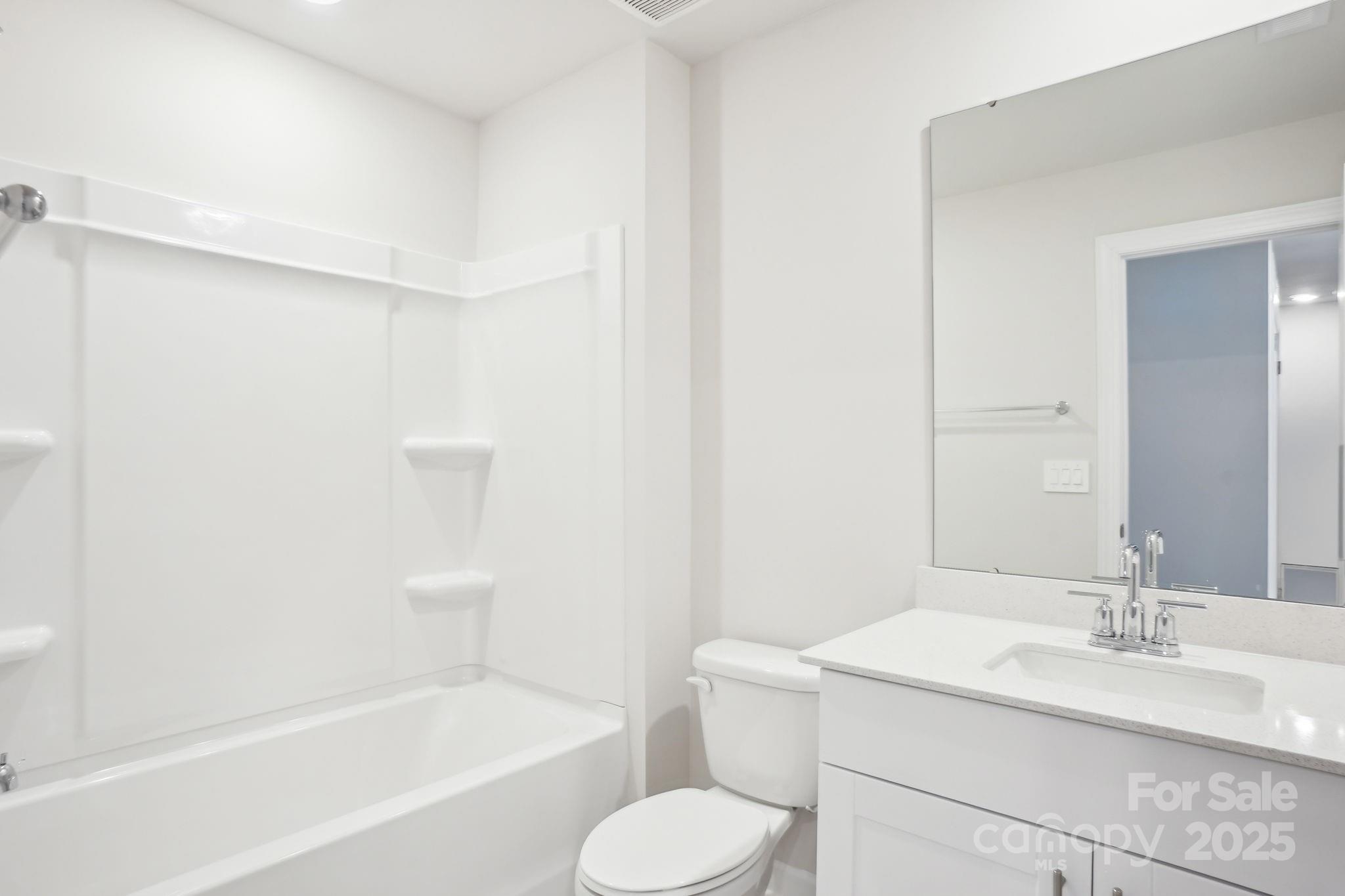 1413 Old Rivers Road Concord, NC 28027 - Photo 17 of 20 a bathroom with a sink toilet and shower