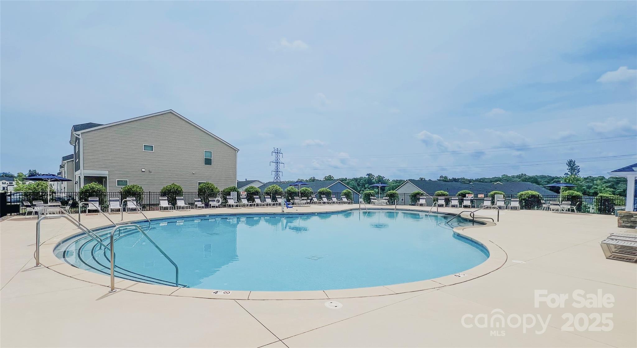 1413 Old Rivers Road Concord, NC 28027 - Photo 18 of 20 a view of a swimming pool with a terrace
