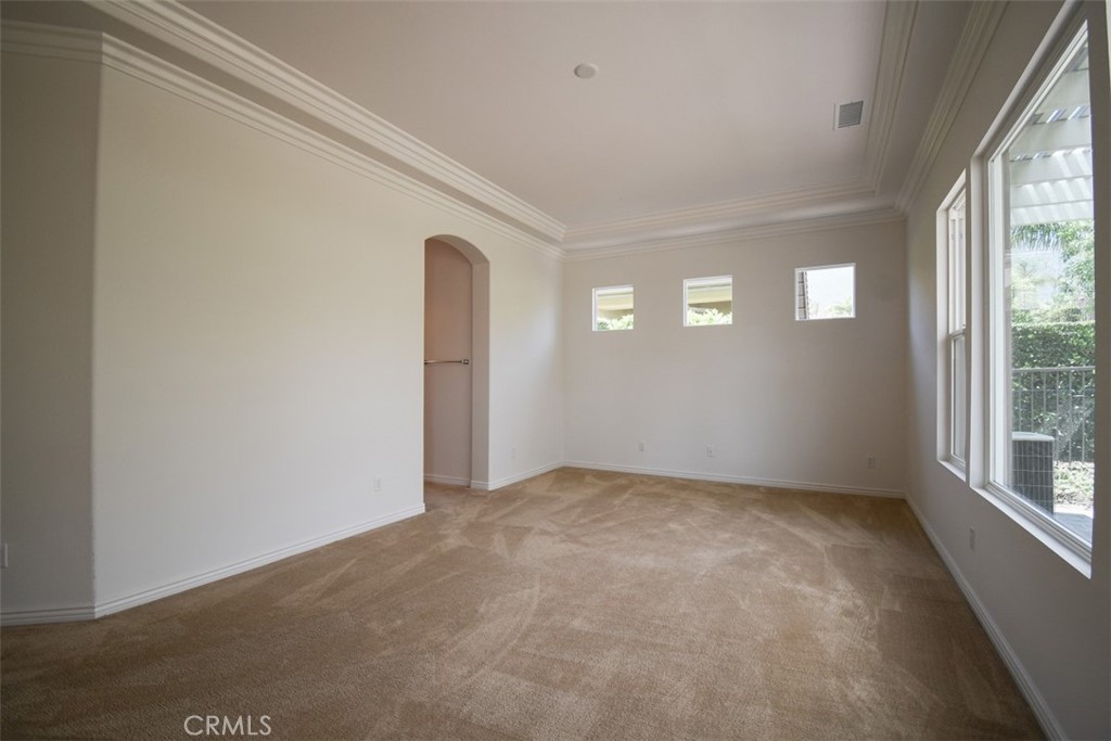 9152 Deergrass Street Corona, CA 92883 - Photo 18 of 32 an empty room with windows
