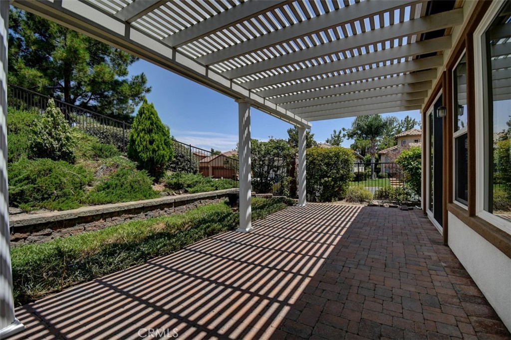 9152 Deergrass Street Corona, CA 92883 - Photo 28 of 32 a view of balcony with wooden floor