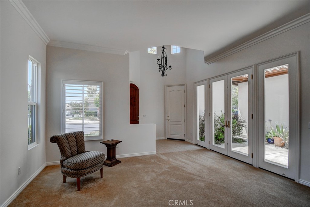 9152 Deergrass Street Corona, CA 92883 - Photo 7 of 32 a living room with furniture and a large window